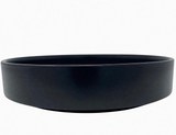 Side view of matte black ceramic display bowl designed for modern and contemporary home décor styling.