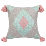 Pastel geometric throw pillow with soft pink tassels featuring a diamond pattern in blush and mint tones on a neutral textured fabric