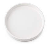 Top view of a matte white round decorative tray on a clean background, minimalist modern home decor accessory